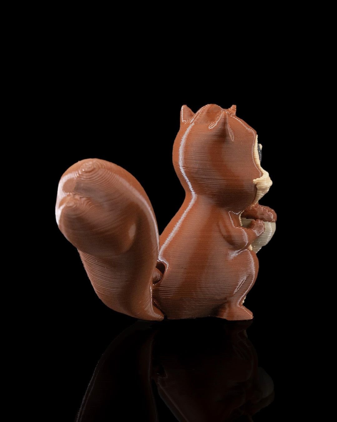 Mini Flexible Squirrel Figure Holding Nut